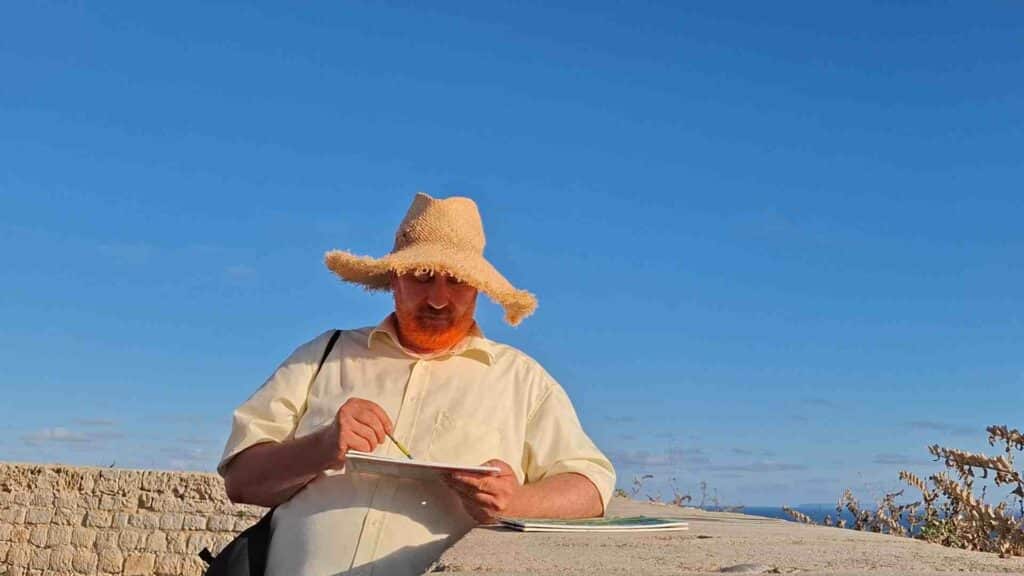 Van-Gogh-Darsteller malt in einem Feld bei Norderstedt für Low-Budget-Filmprojekt